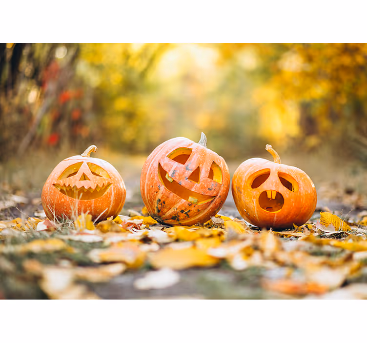 Gesneden pompoengezichten fotobehang halloween - TenStickers