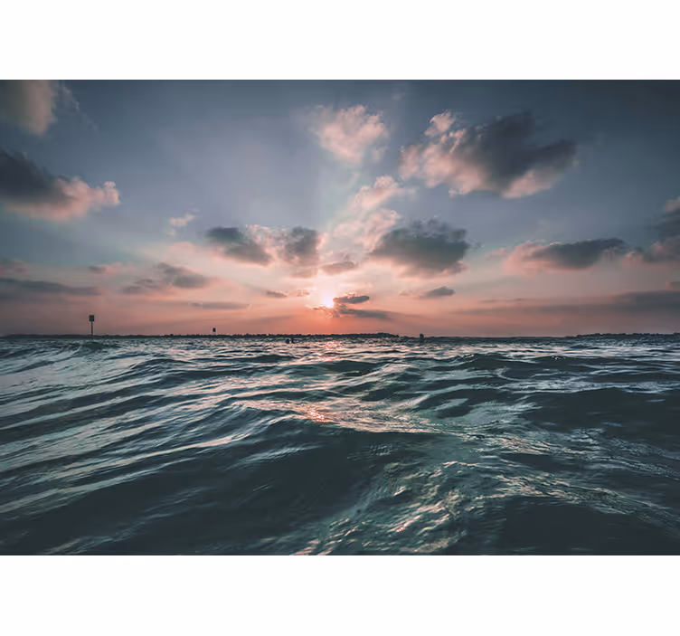Fotobehang strand zonsondergang boven de golven - TenStickers