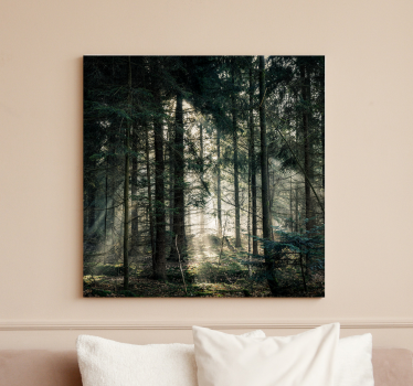 Canvas landschap zonnestralen door bladeren - TenStickers