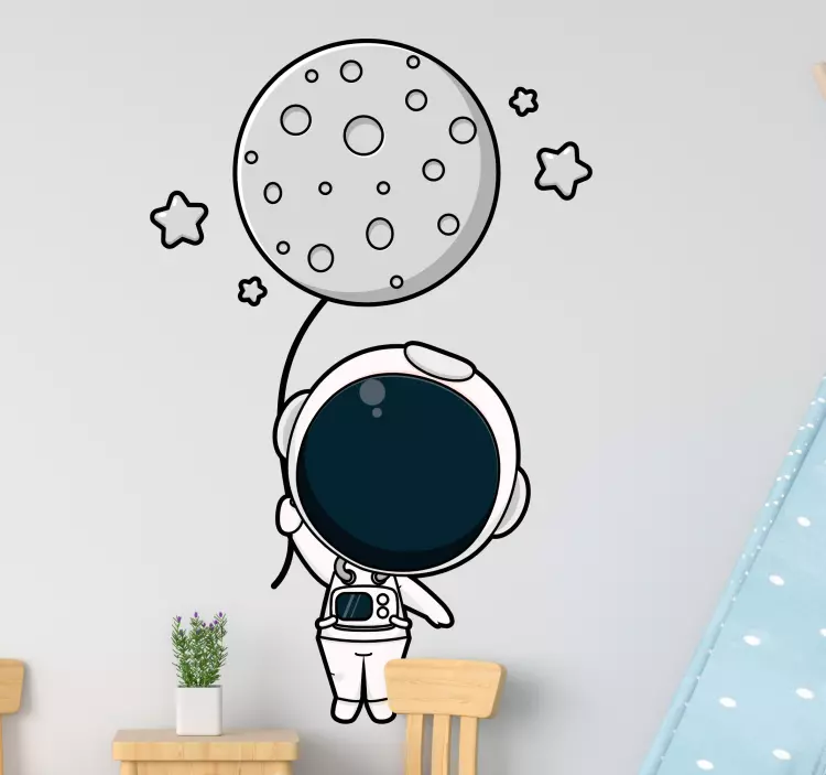 Astronaut met ballon muursticker kinderkamer - TenStickers