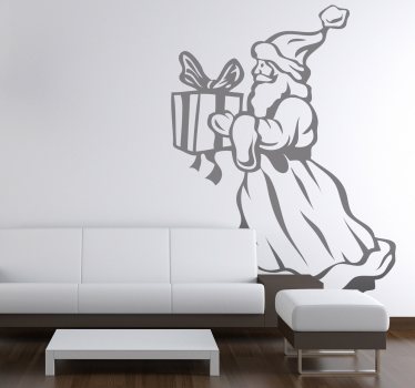 Kerstman met cadeau sticker - TenStickers