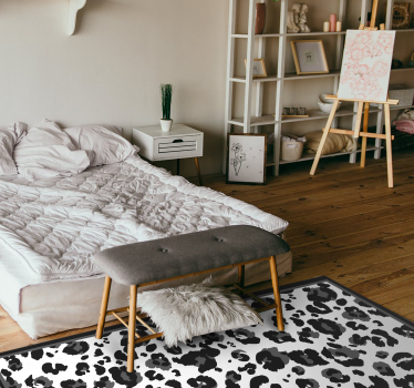 Zwart vlekkenpatroon vinyl vloerkleed dierenprint - TenStickers